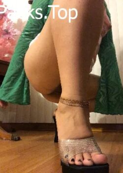 Asiática en tacones altos coño sexy 2